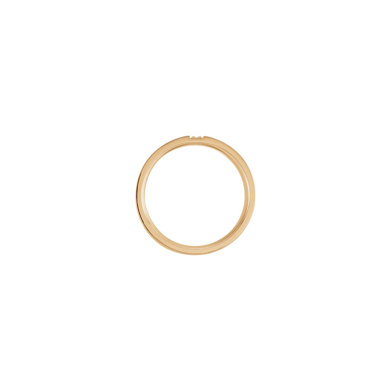 Upper view of a 14k rose gold ring featuring three vertically set round white diamonds in the center